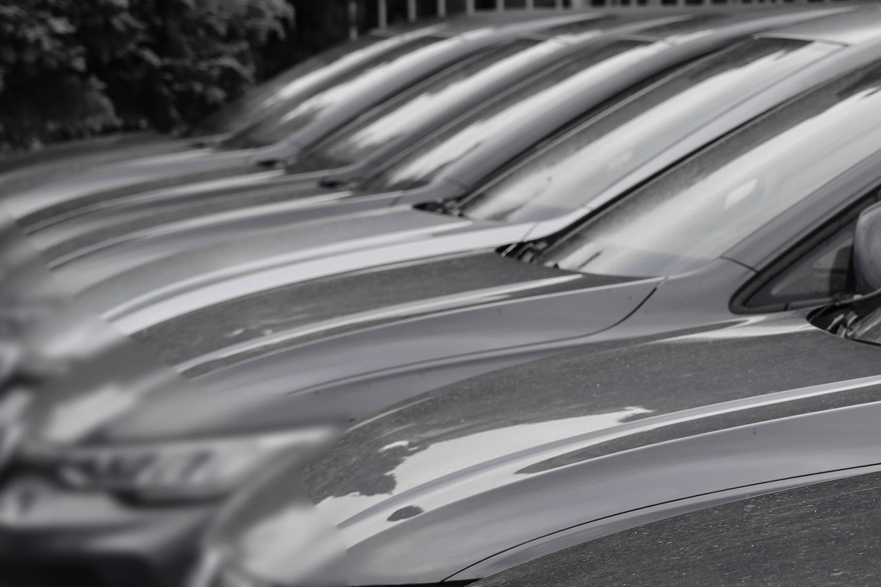 dealership and service. second hand. same group team a lot Cars VEHICLE auto in a row EV dealership